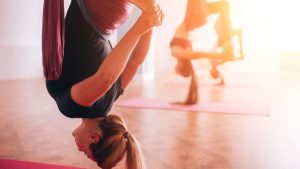 Aerial Yoga: Tips for Beginners, Health Benefits, Poses
